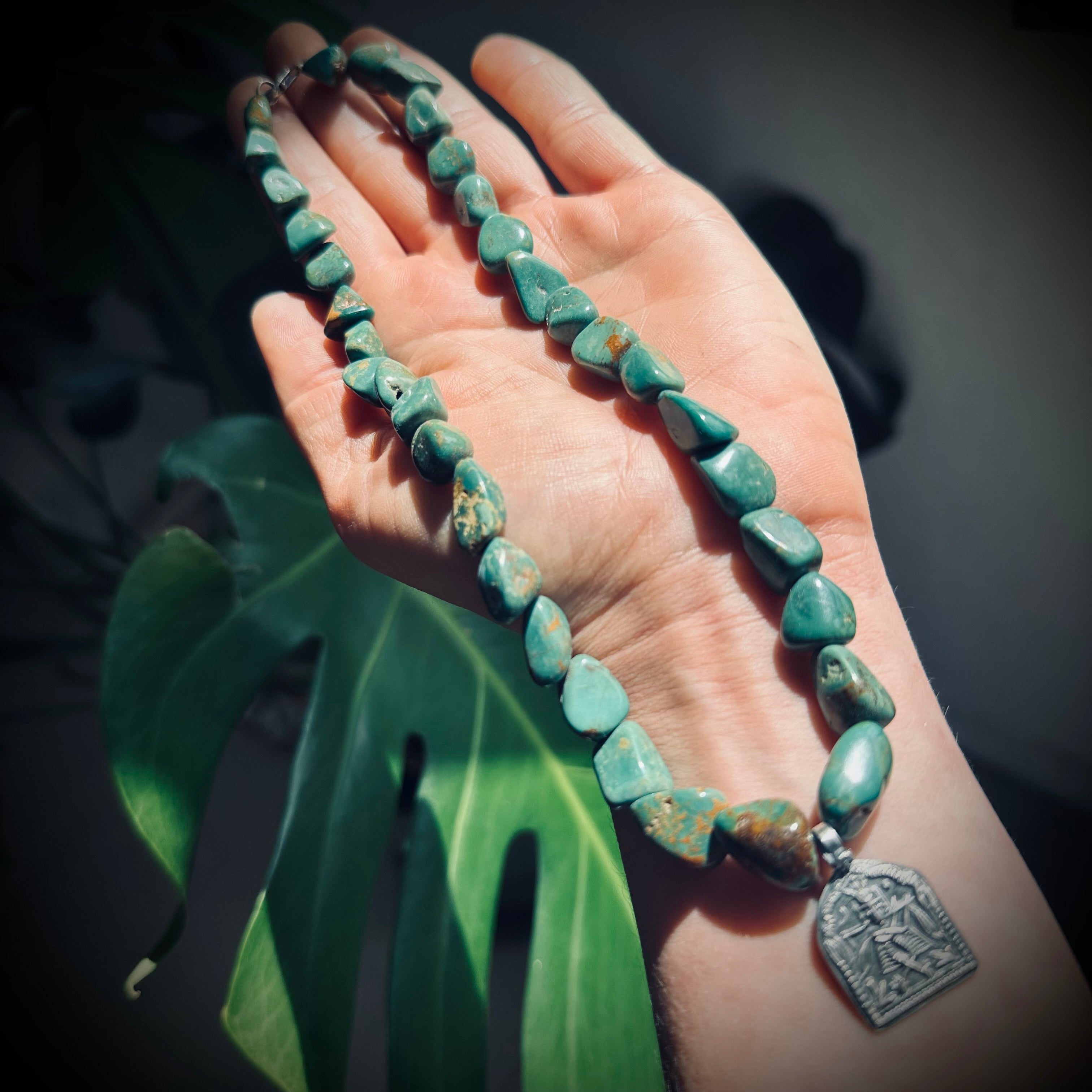 15” reworked chunky turquoise bead necklace with spiritual talisman in sterling silver