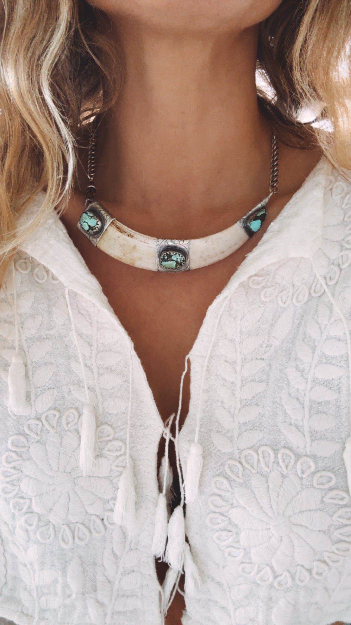 4.5” boars tusk with turquoise on 12.5” antique sterling silver Albert chain