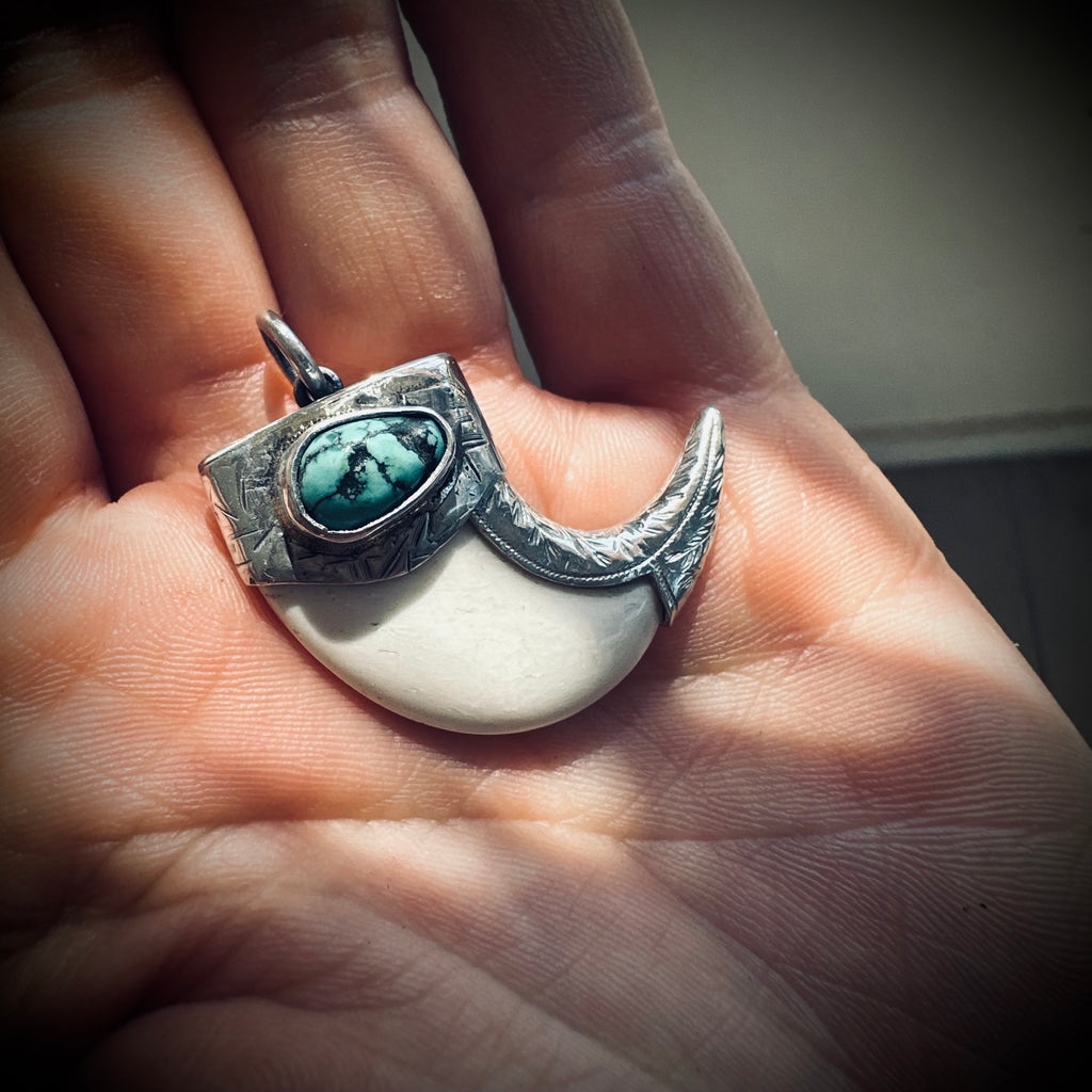 Sterling silver hallmarked claw-style pendant with turquoise and deer antler