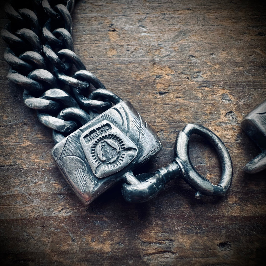 7.5” reworked double chain fossilised tooth bracelet in hallmarked engraved sterling silver with antique clip