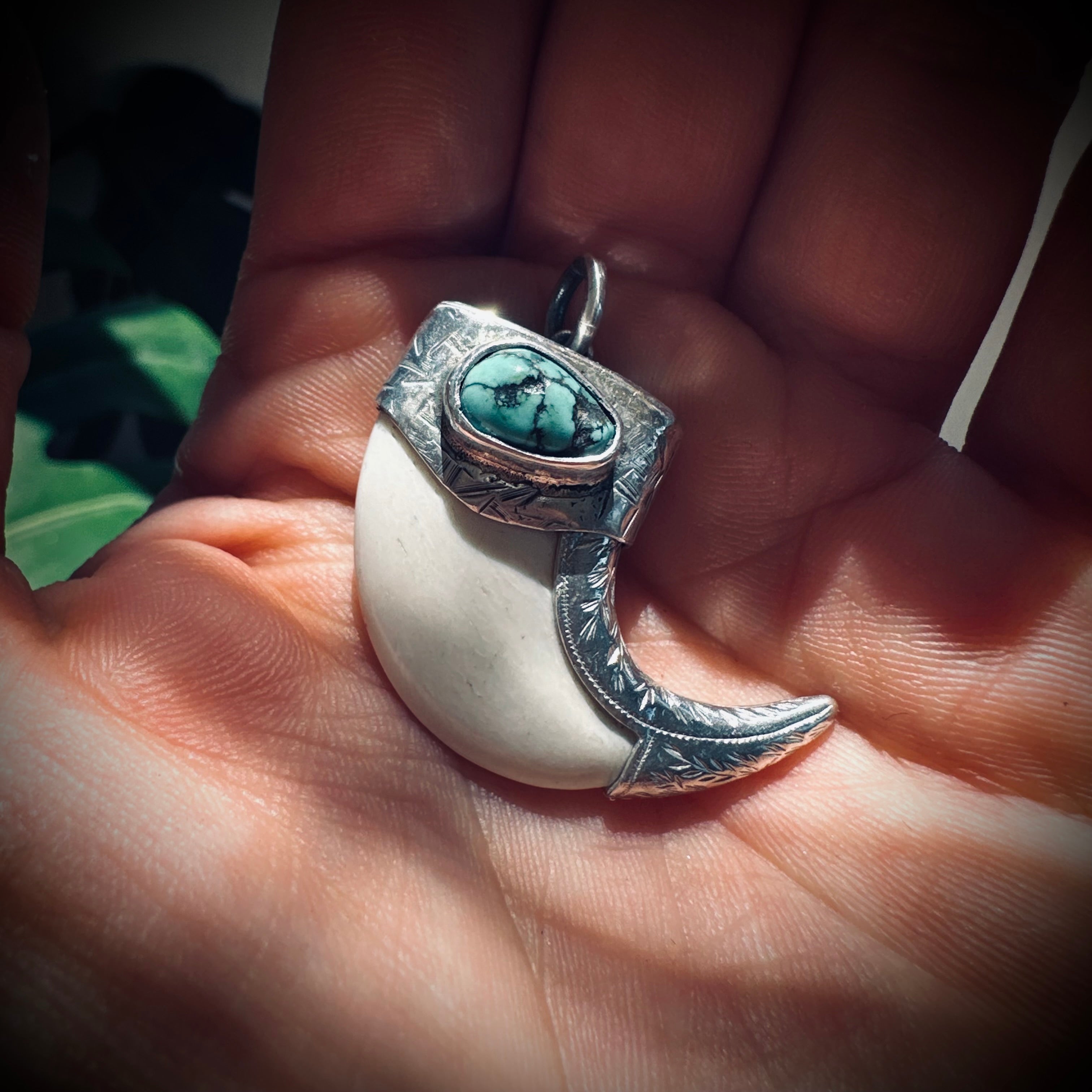 Sterling silver hallmarked claw-style pendant with turquoise and deer antler