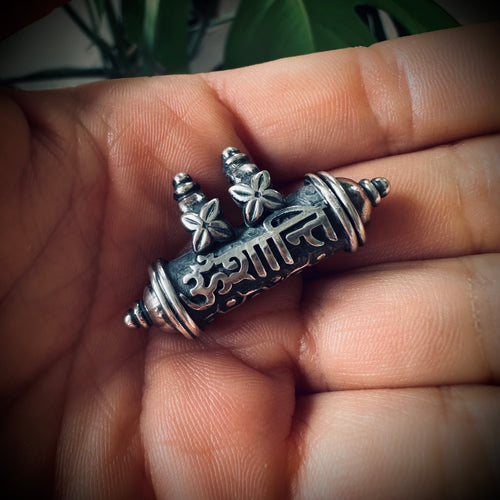 Re-worked vintage silver “Aum Shantih” (peace prayer) pendant