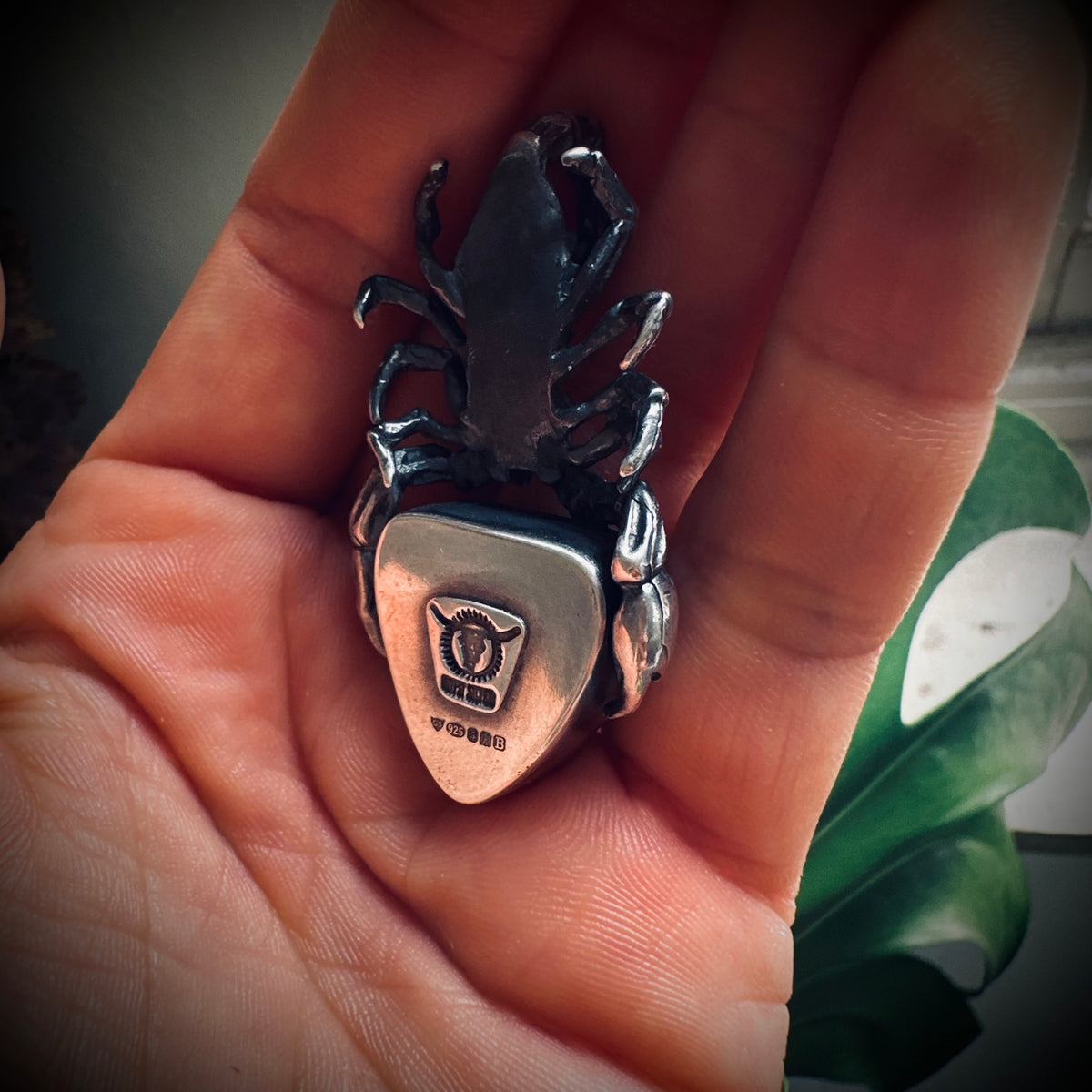 Hallmarked sterling silver and turquoise scorpion pendant