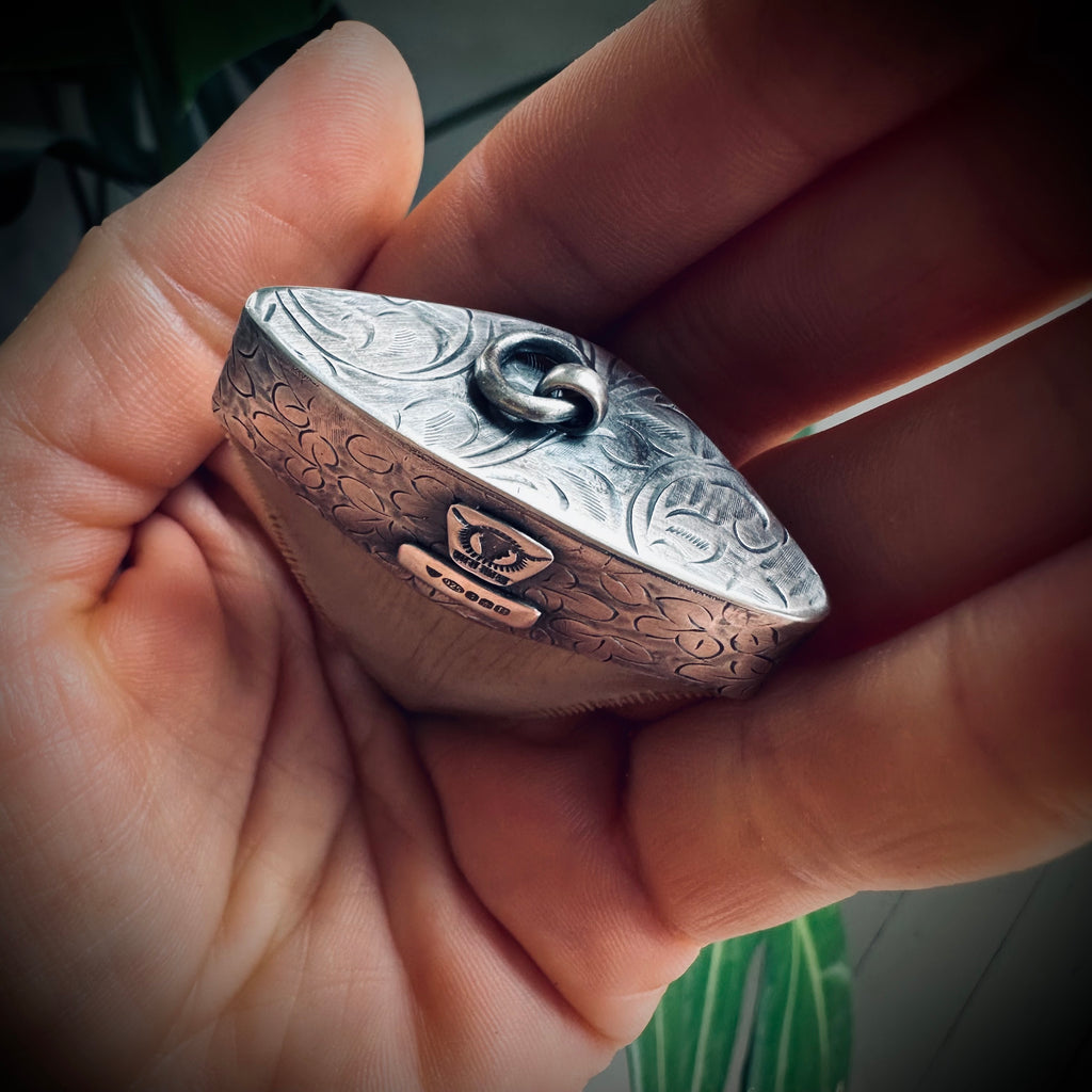 Large fossilised shark tooth pendant in hallmarked sterling silver with turquoise