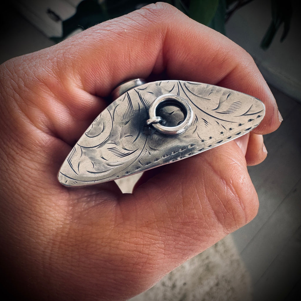 Sterling silver hallmarked fossil shark tooth pendant with turquoise