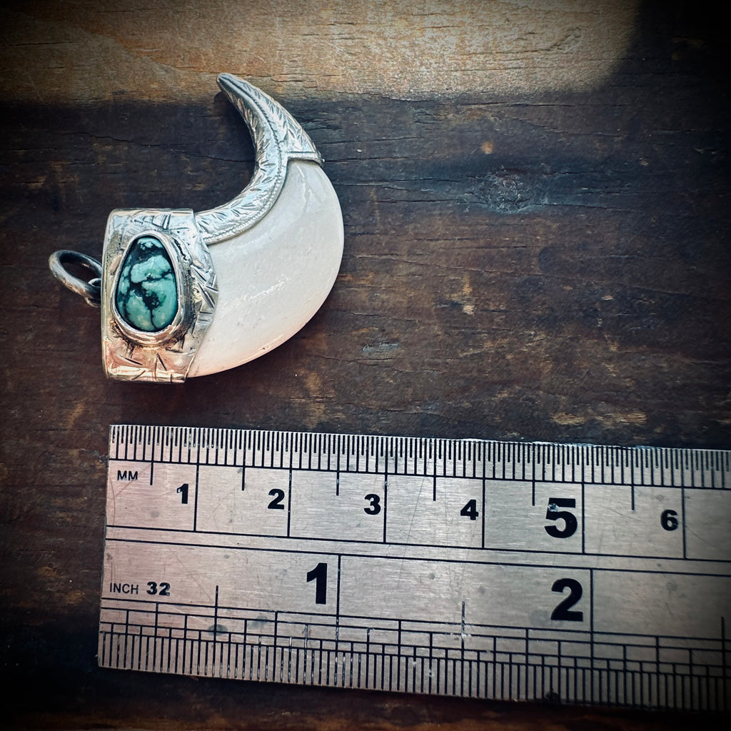Sterling silver hallmarked claw-style pendant with turquoise and deer antler