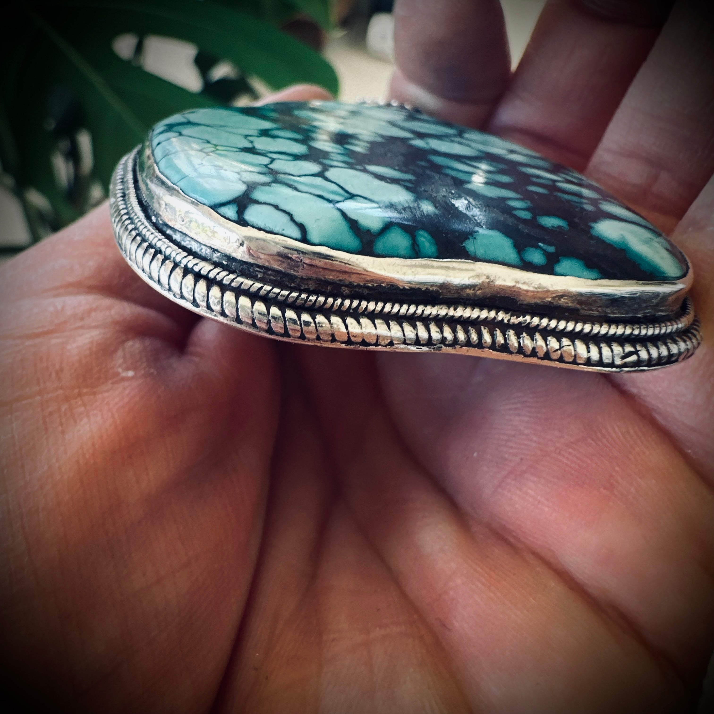 Vintage large turquoise slab pendant in silver contrasting brass engraved backing