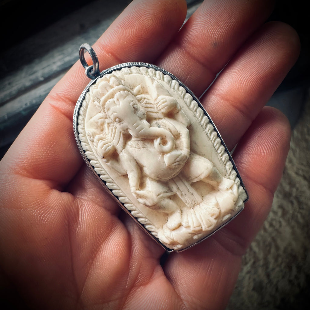 Reworked vintage carved bone Ganesha pendant in sterling silver ornate setting