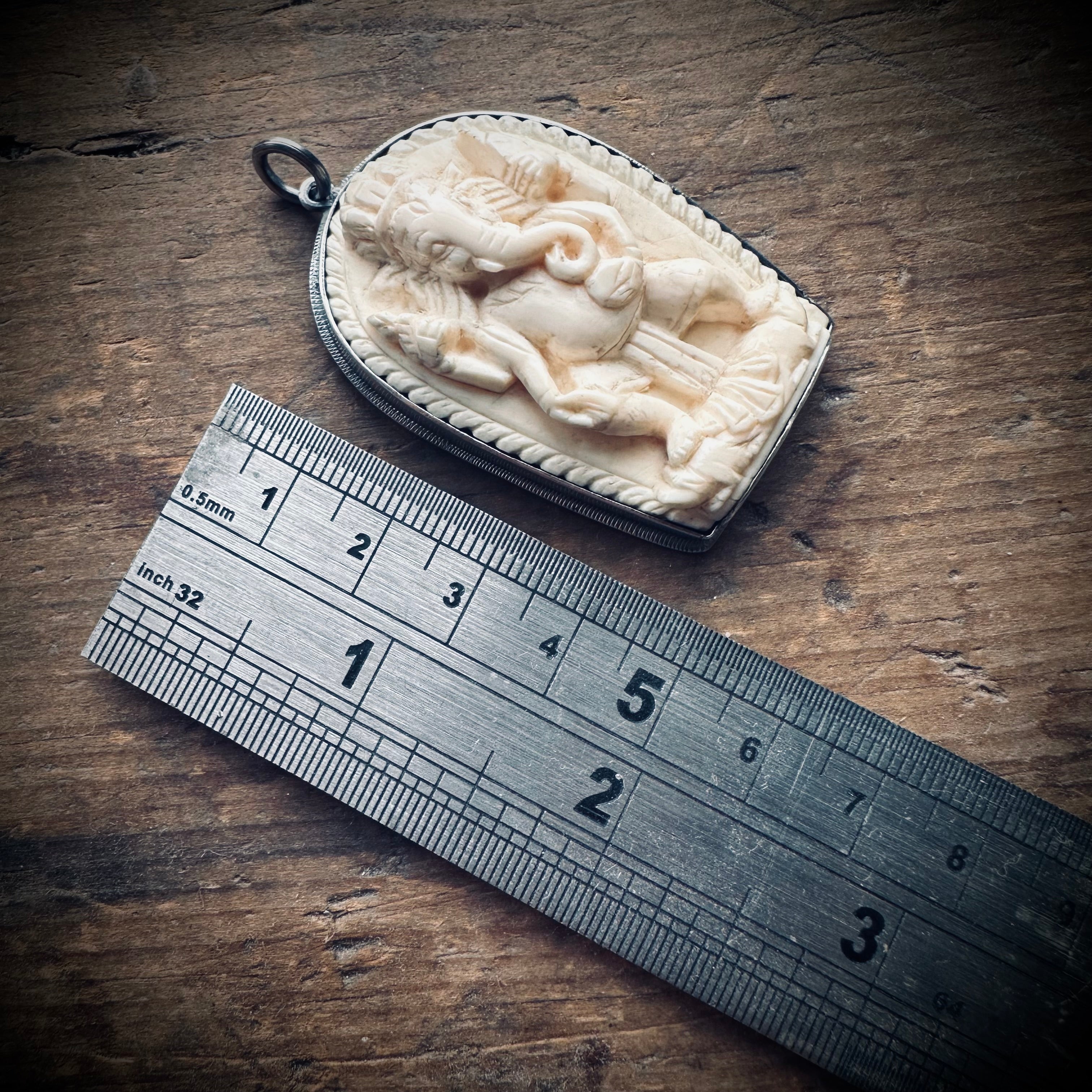 Reworked vintage carved bone Ganesha pendant in sterling silver ornate setting