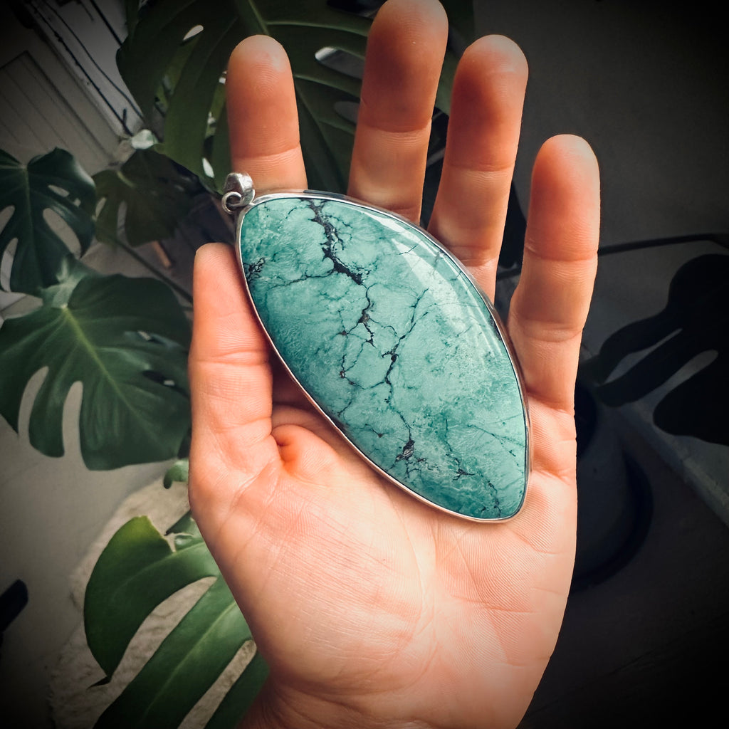 XL vintage freeform turquoise slab pendant in open backed sterling silver setting