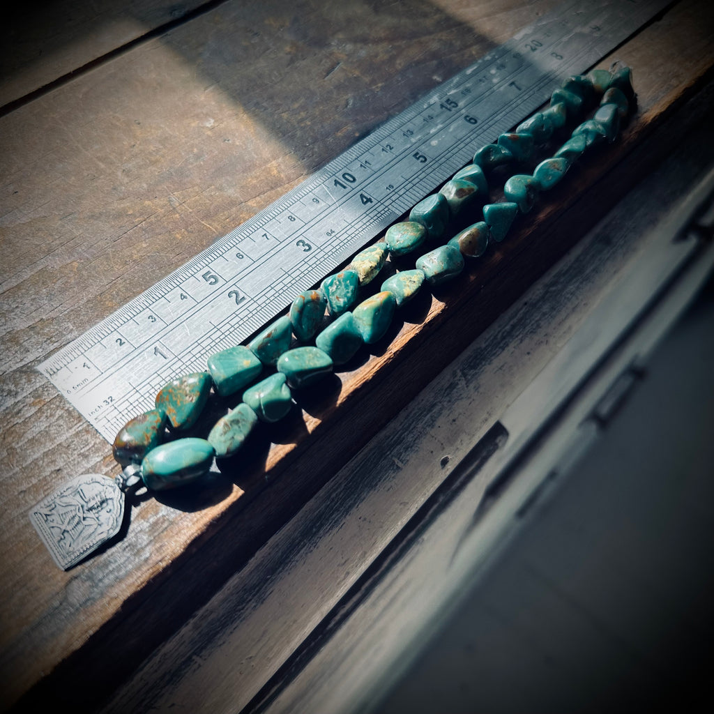15” reworked chunky turquoise bead necklace with spiritual talisman in sterling silver