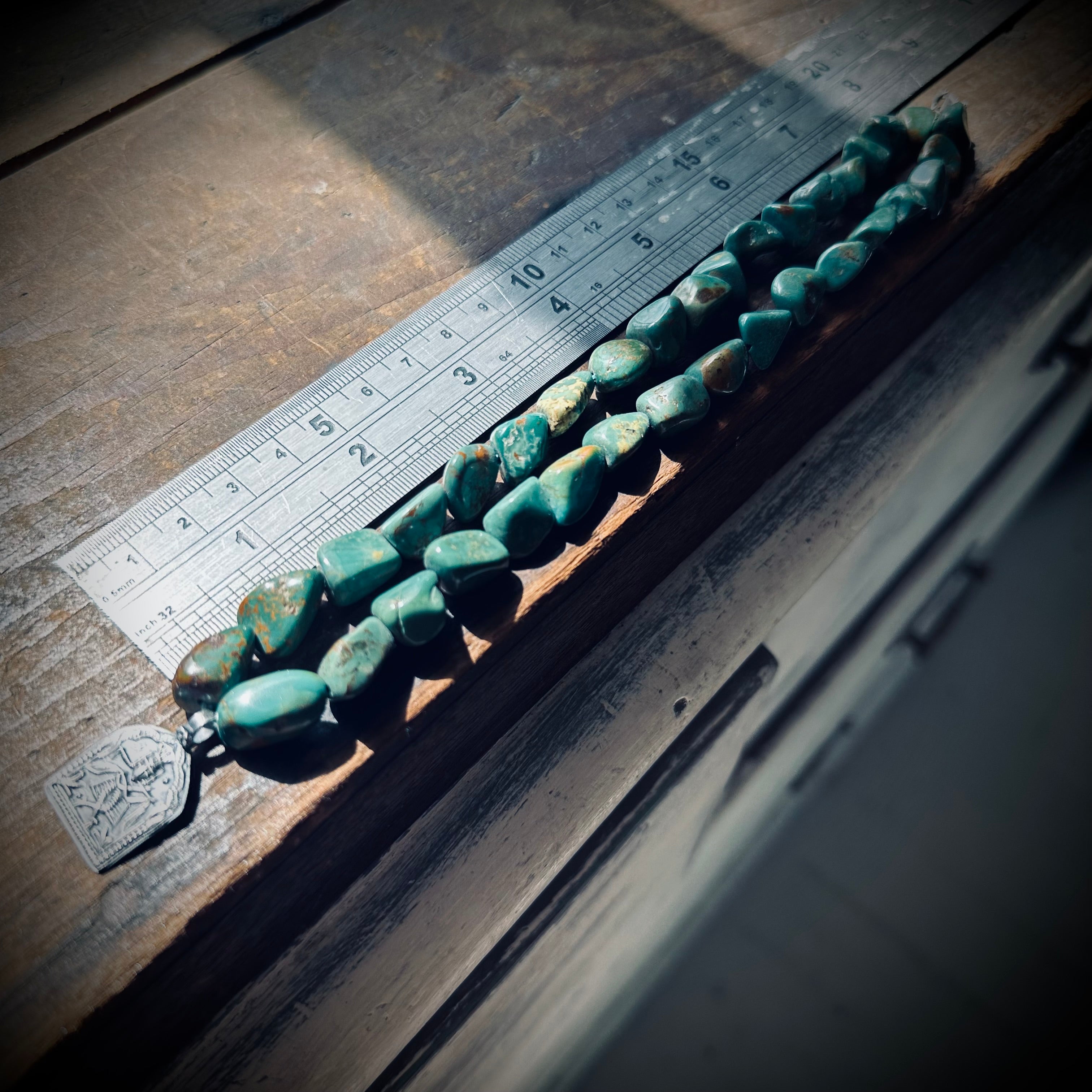 15” reworked chunky turquoise bead necklace with spiritual talisman in sterling silver