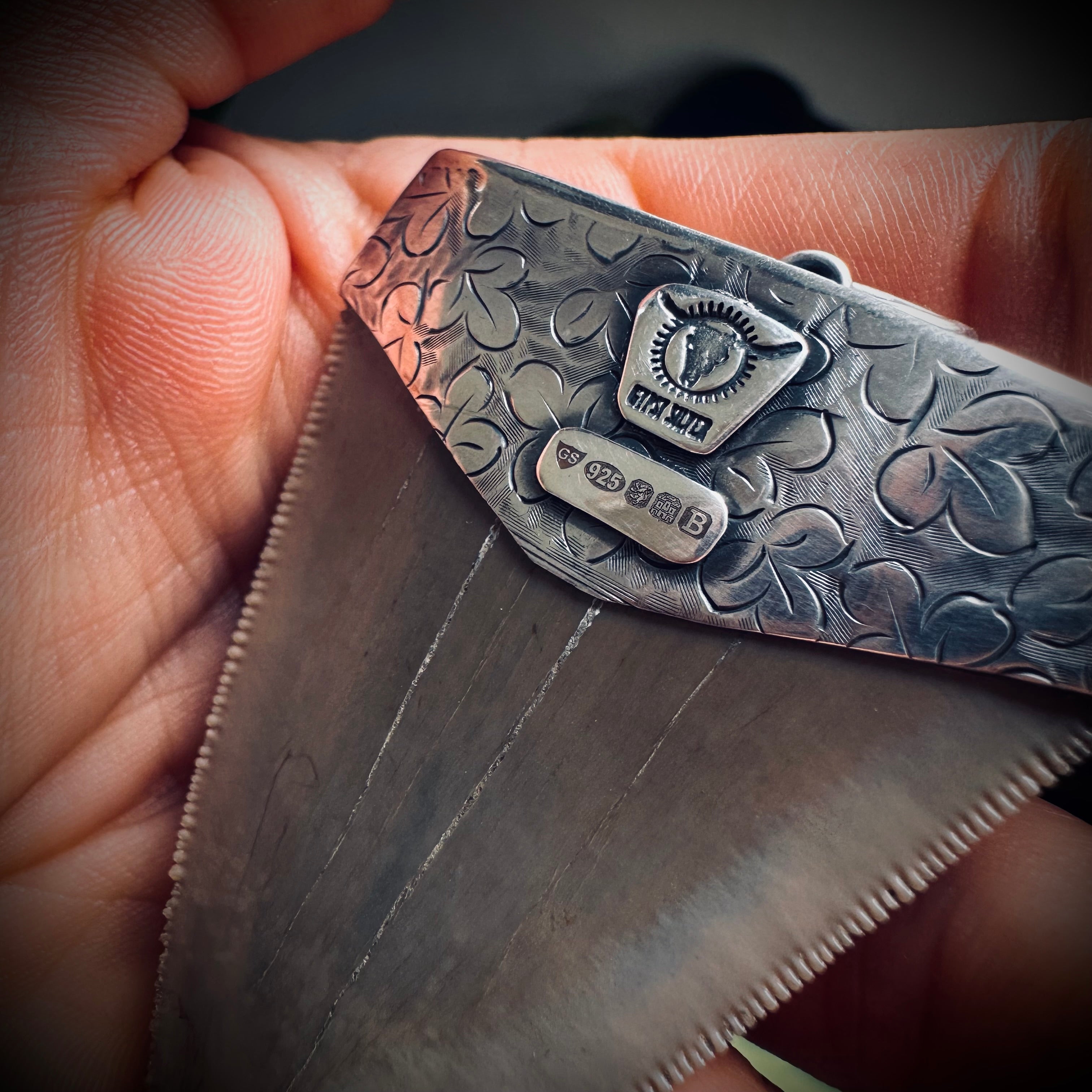 Fossilised shark tooth pendant in engraved hallmarked sterling silver