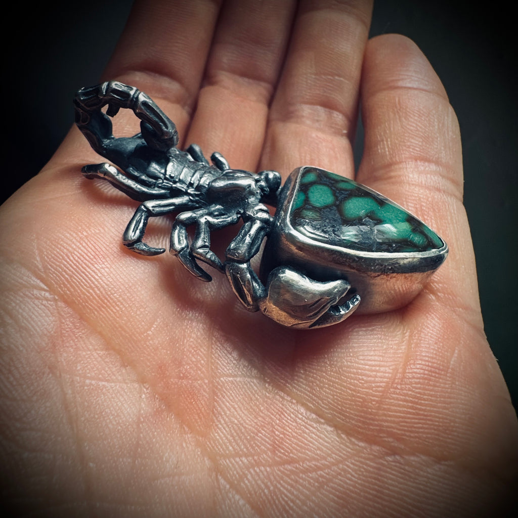 Hallmarked sterling silver and turquoise scorpion pendant