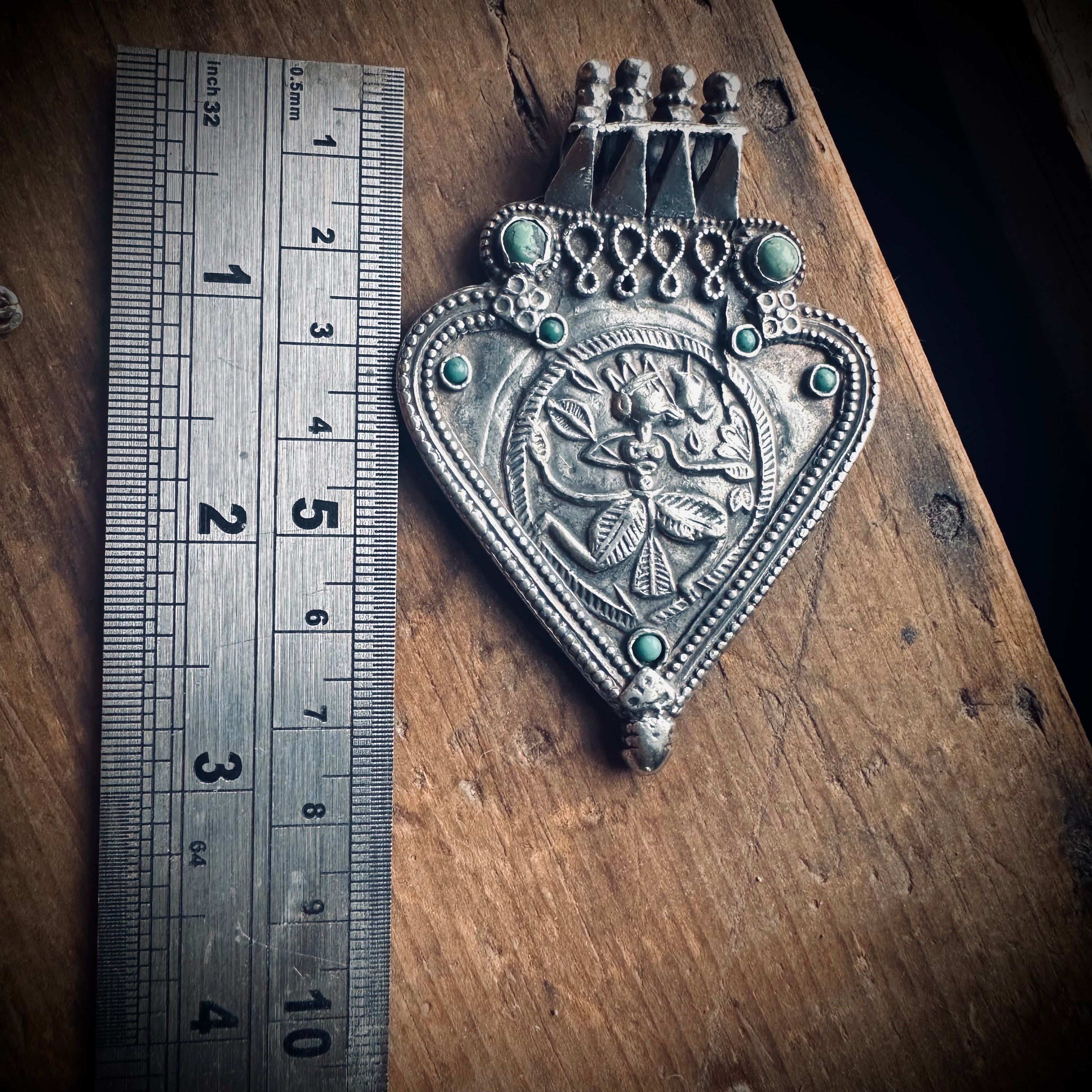 Large vintage Indian talisman pendant with turquoise in sterling silver