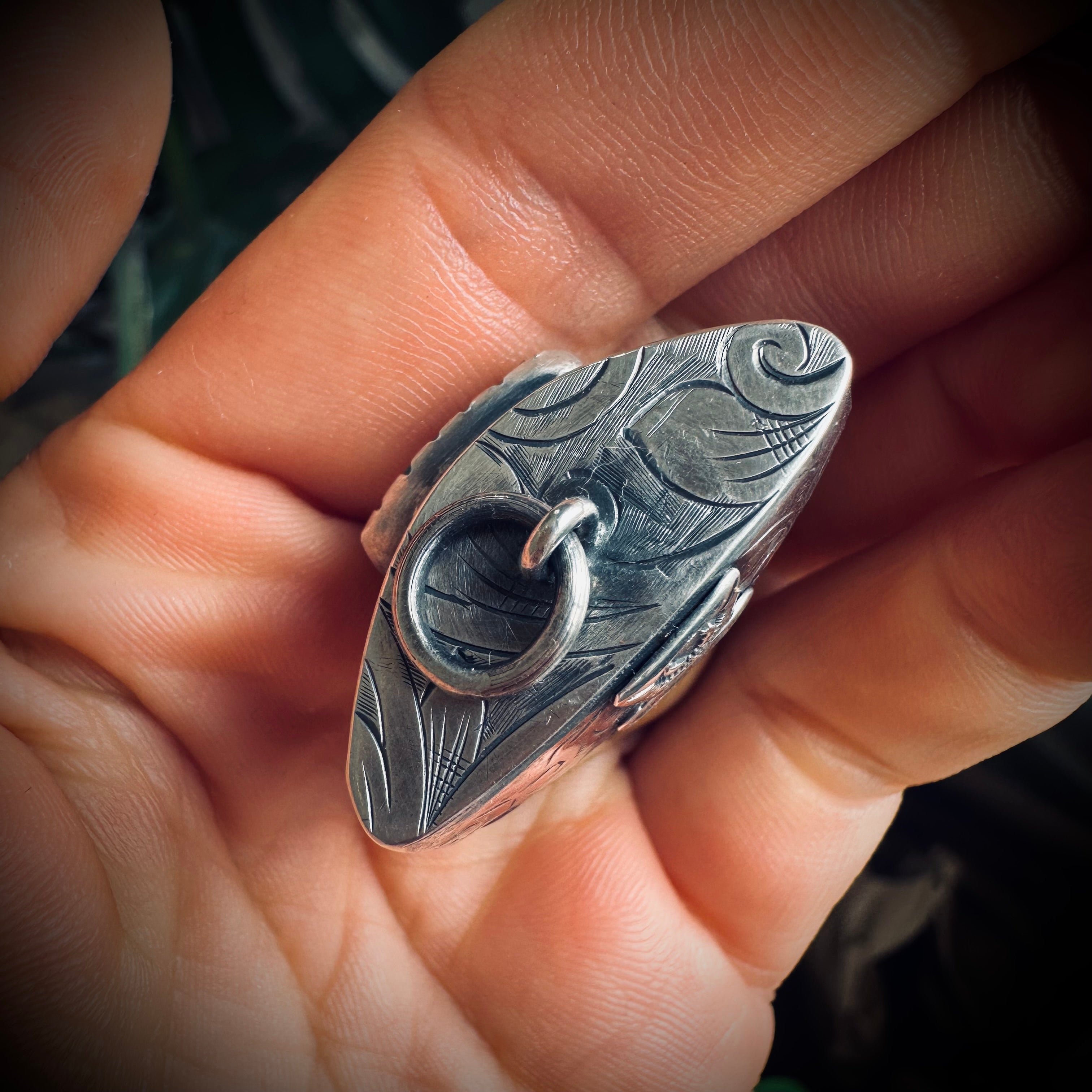 Fossilised shark tooth pendant in engraved hallmarked sterling silver