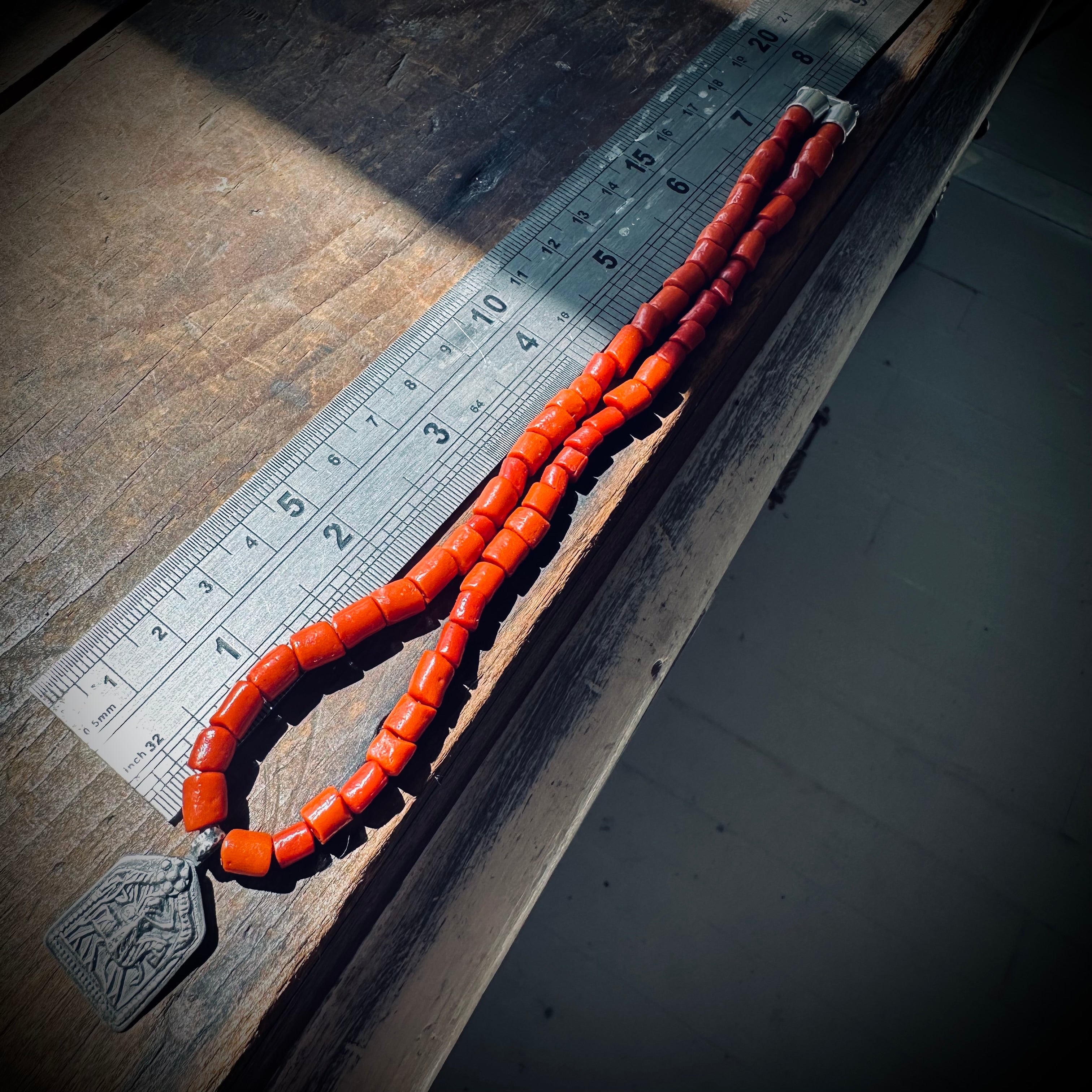 15” reworked red coral bead necklace with spiritual talisman in sterling silver