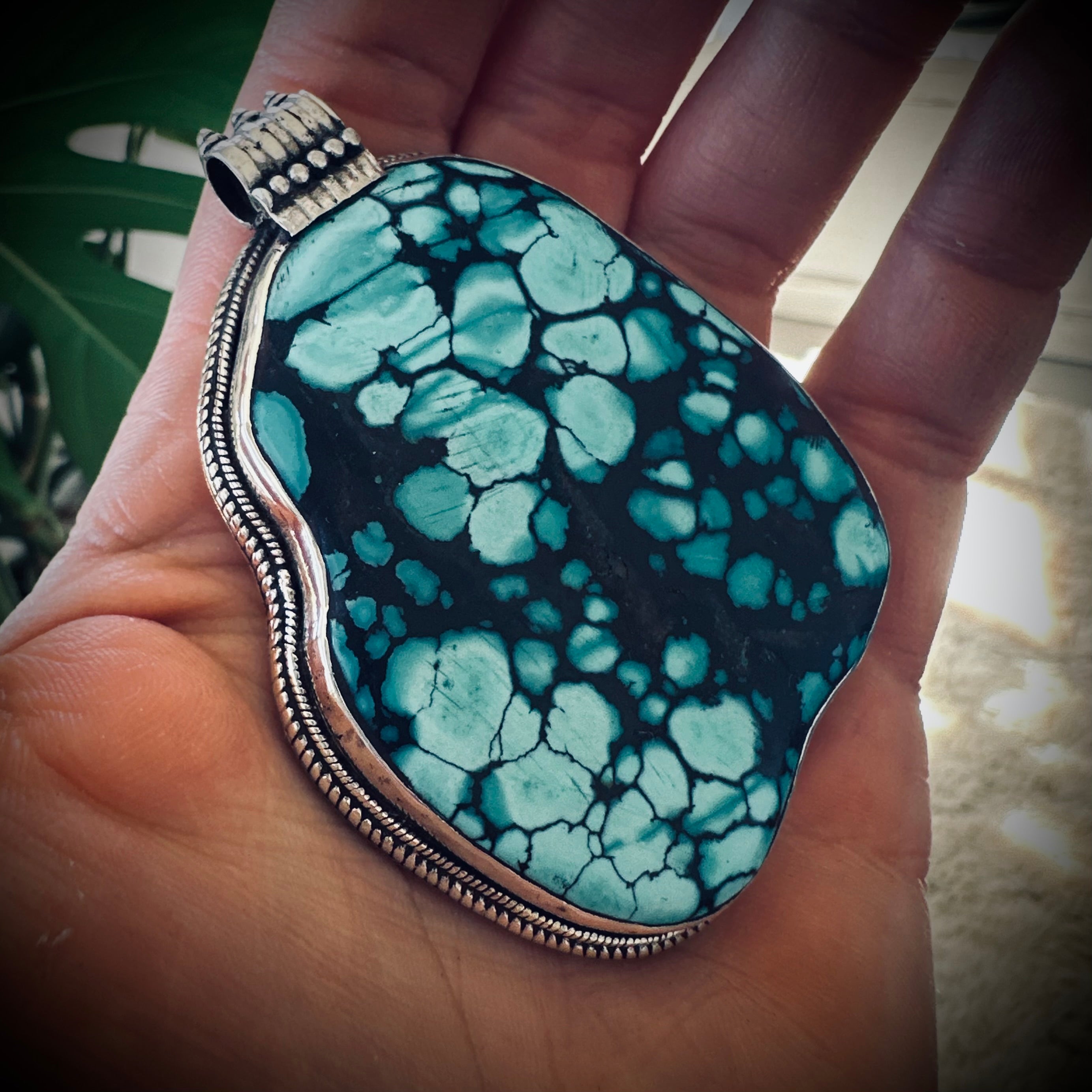 Vintage large turquoise slab pendant in silver contrasting brass engraved backing