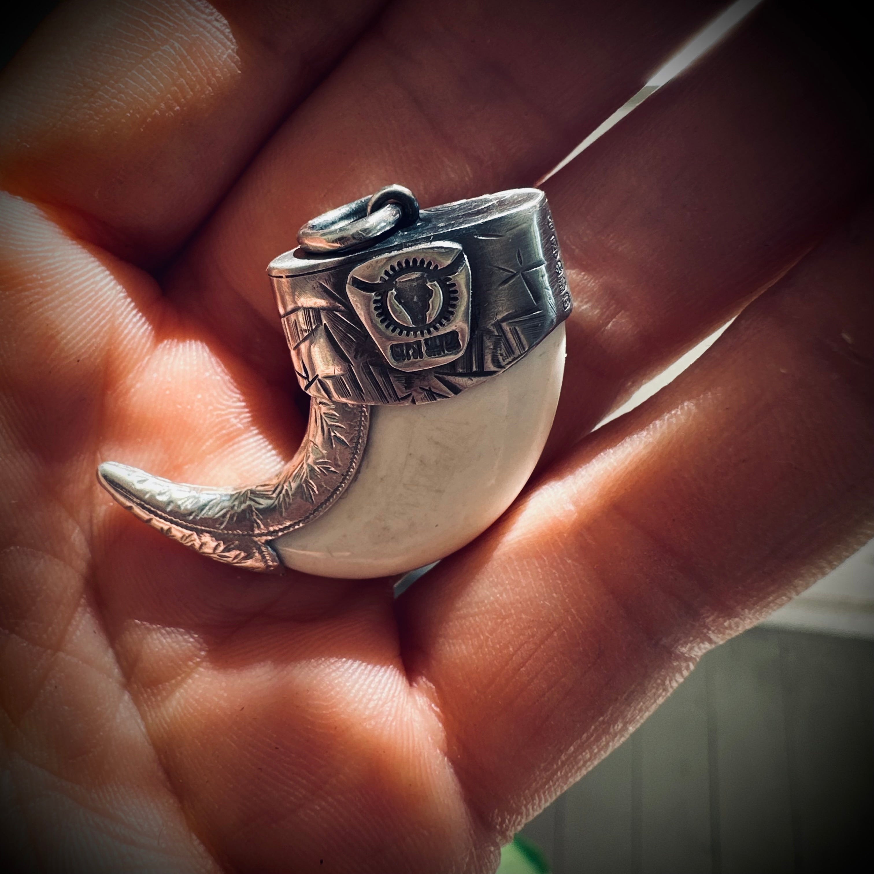 Sterling silver hallmarked claw-style pendant with turquoise and deer antler