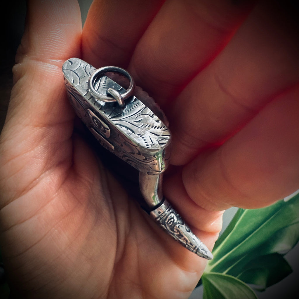 XL Hallmarked sterling silver and turquoise claw pendant in black onyx