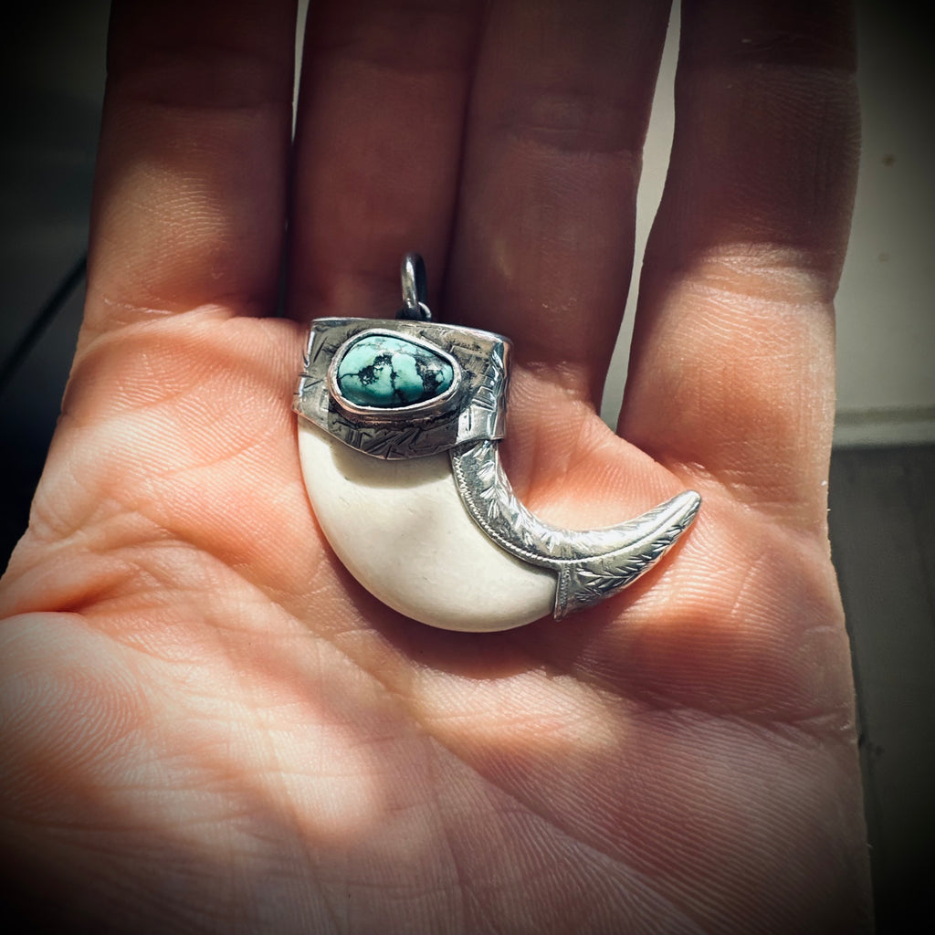 Sterling silver hallmarked claw-style pendant with turquoise and deer antler