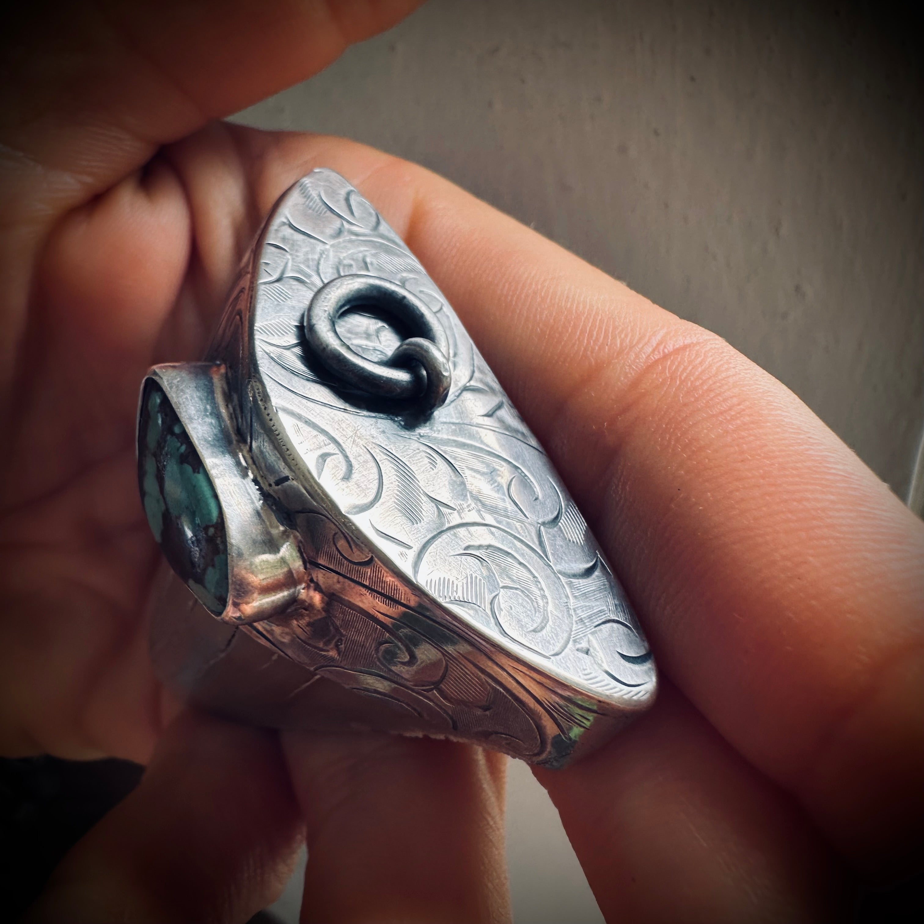 Fossilised shark tooth pendant in engraved hallmarked sterling silver