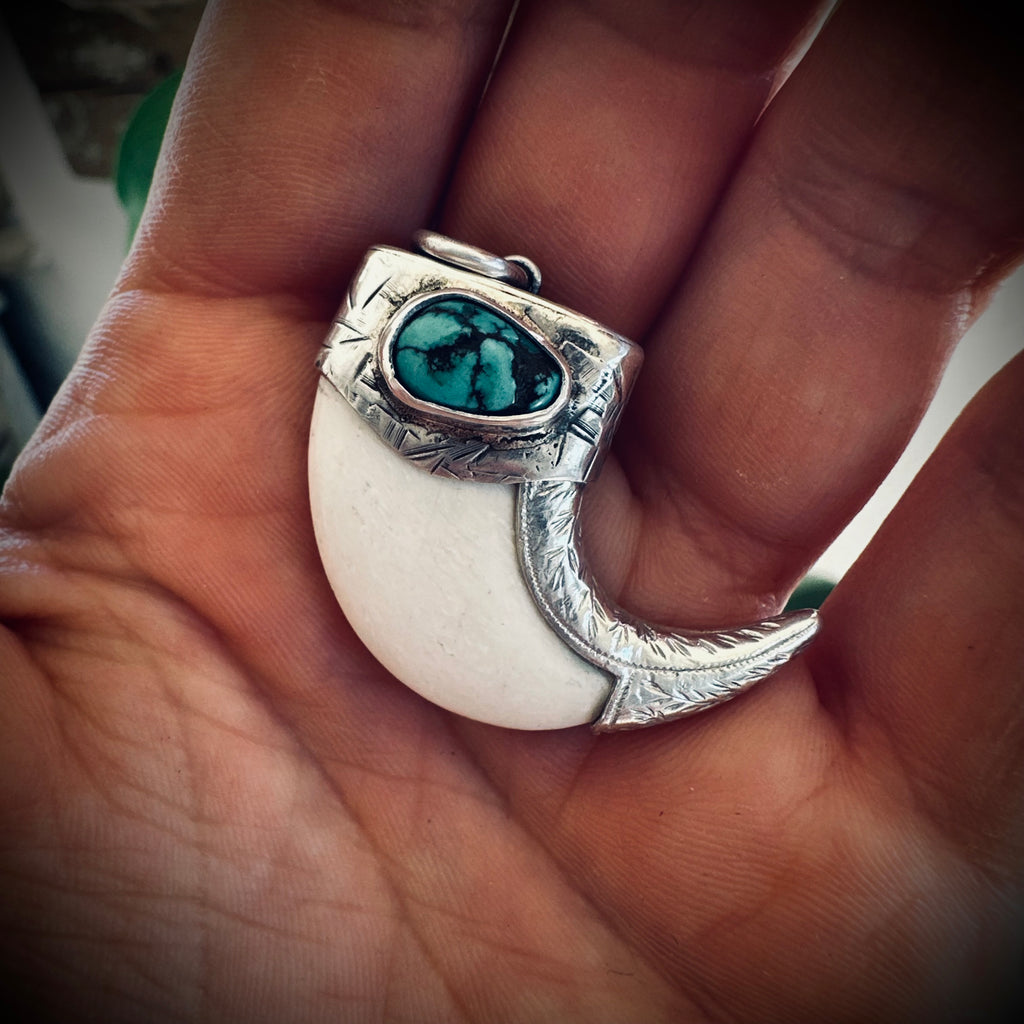 Sterling silver hallmarked claw-style pendant with turquoise and deer antler