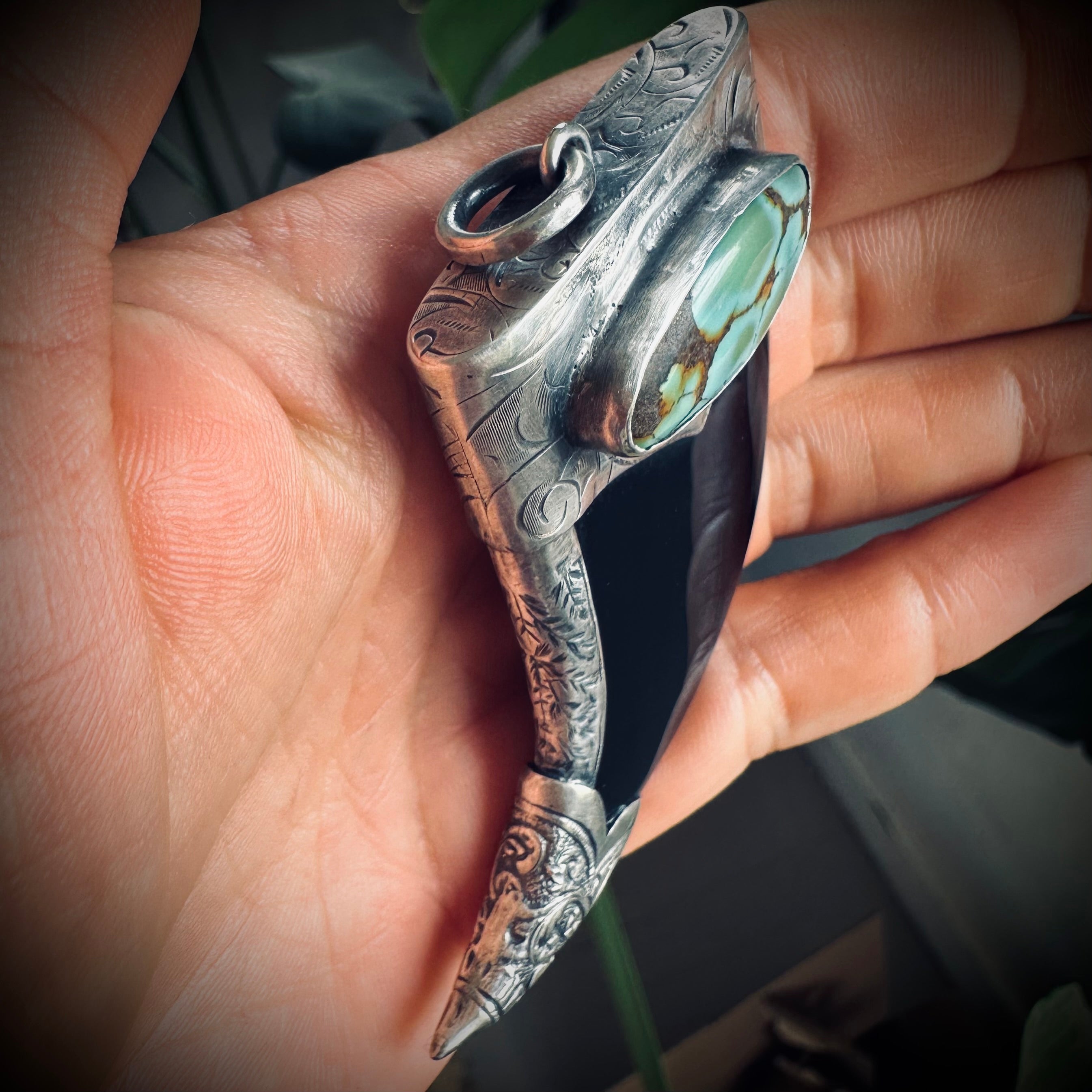 Carved onyx claw style pendant with turquoise in hallmarked sterling silver