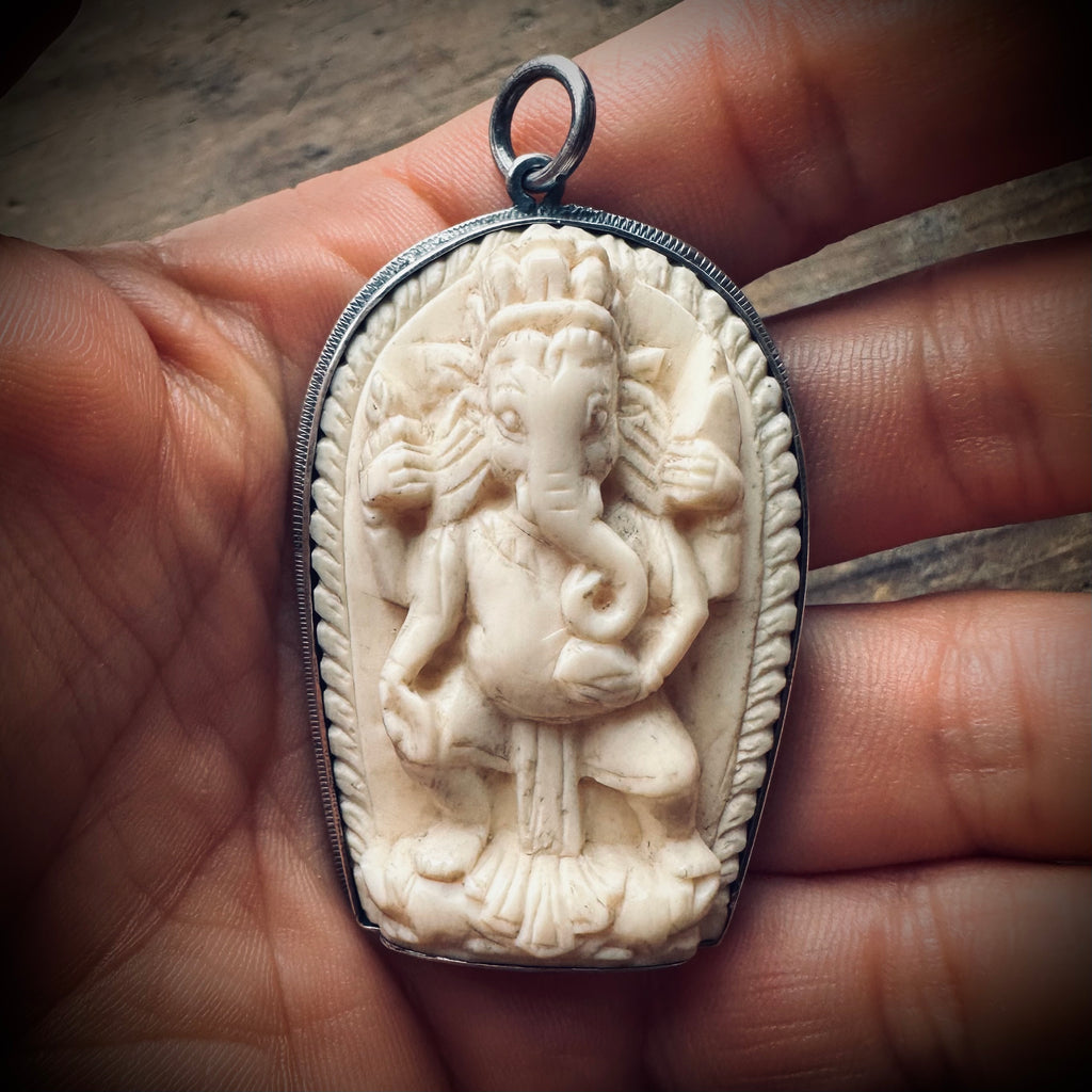 Reworked vintage carved bone Ganesha pendant in sterling silver ornate setting
