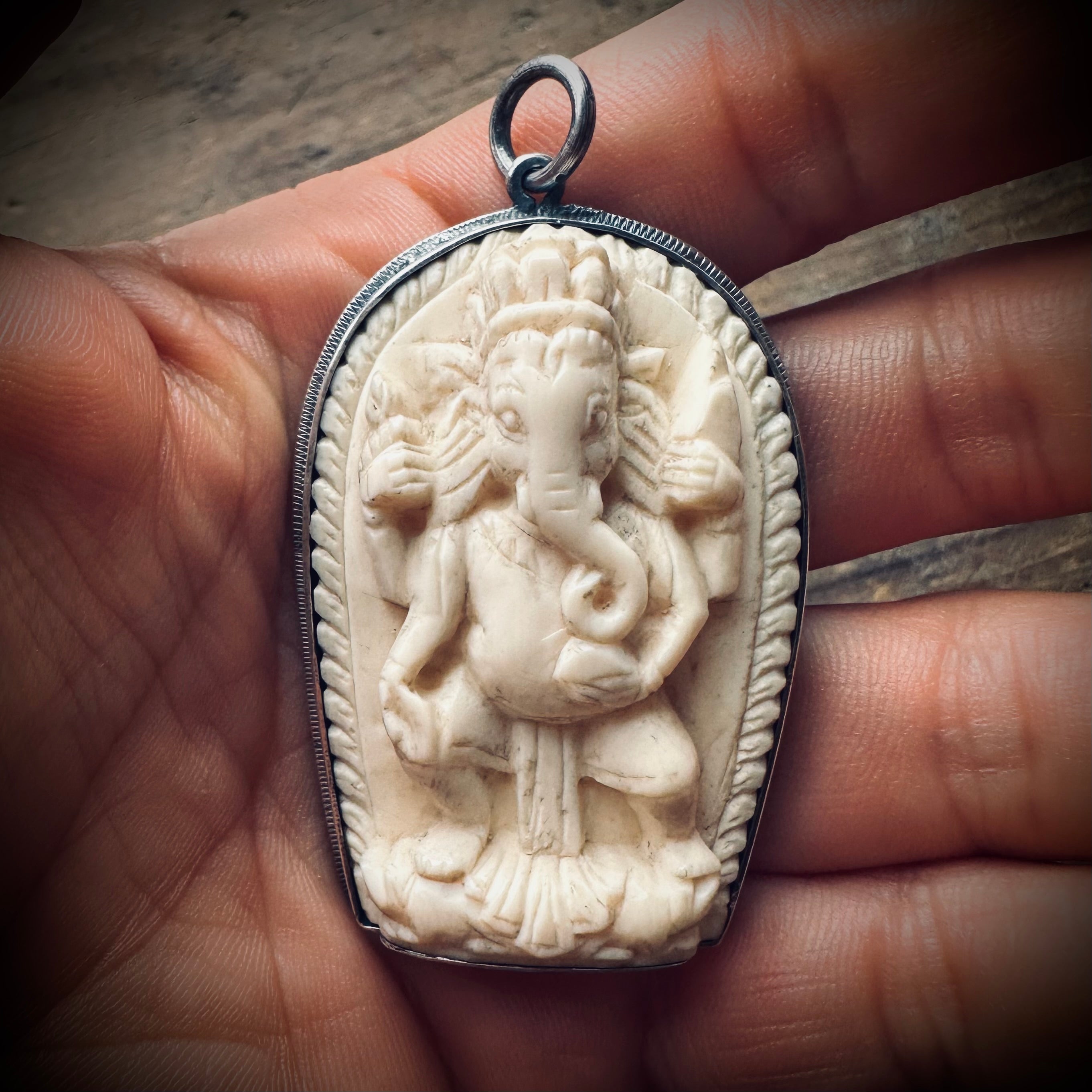 Reworked vintage carved bone Ganesha pendant in sterling silver ornate setting