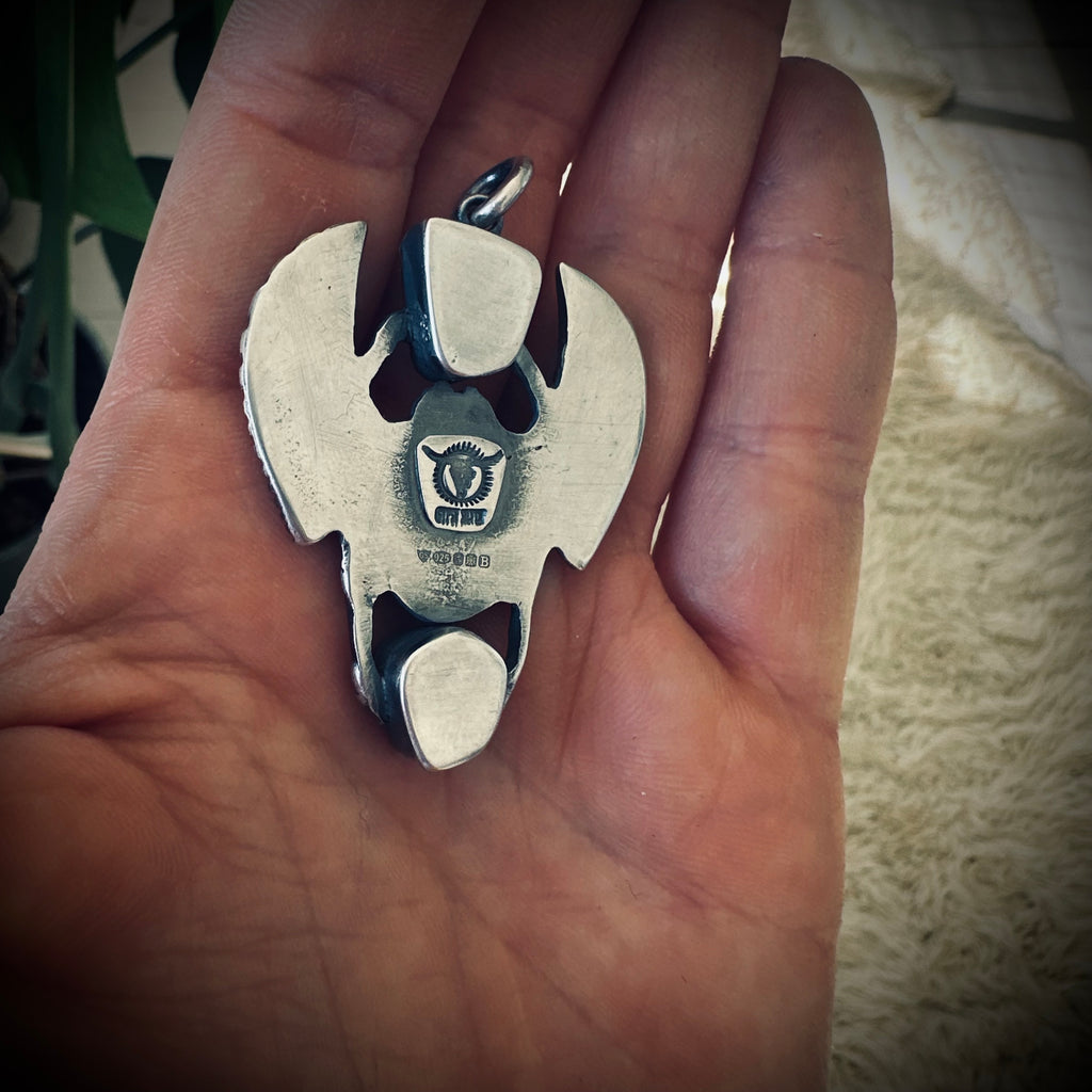 Sterling silver hallmarked scarab pendant with turquoise