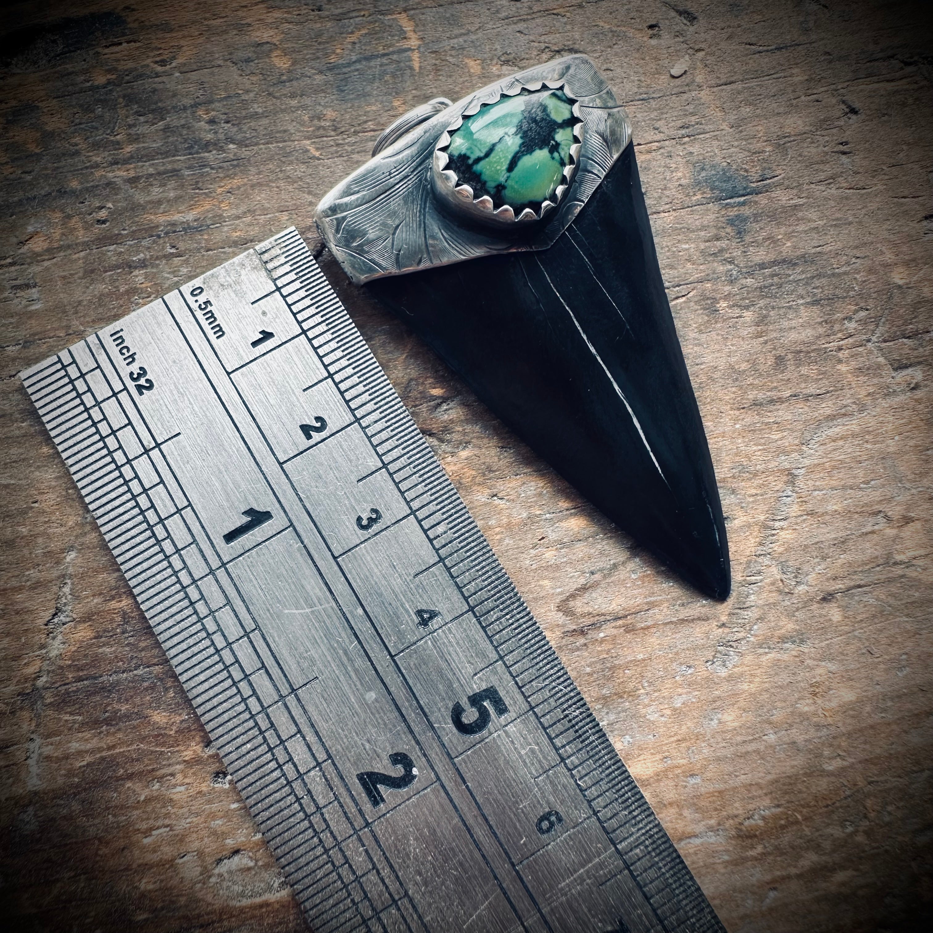 Fossilised shark tooth pendant in engraved hallmarked sterling silver
