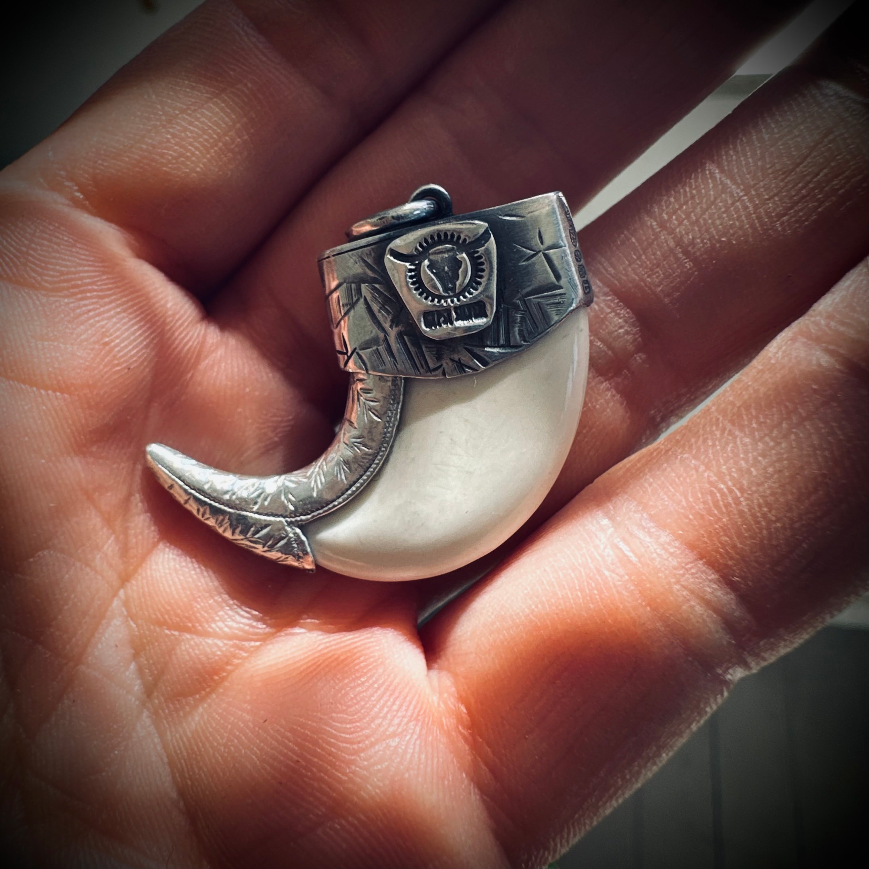 Sterling silver hallmarked claw-style pendant with turquoise and deer antler