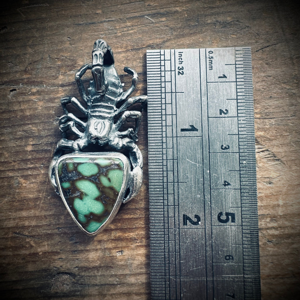 Hallmarked sterling silver and turquoise scorpion pendant