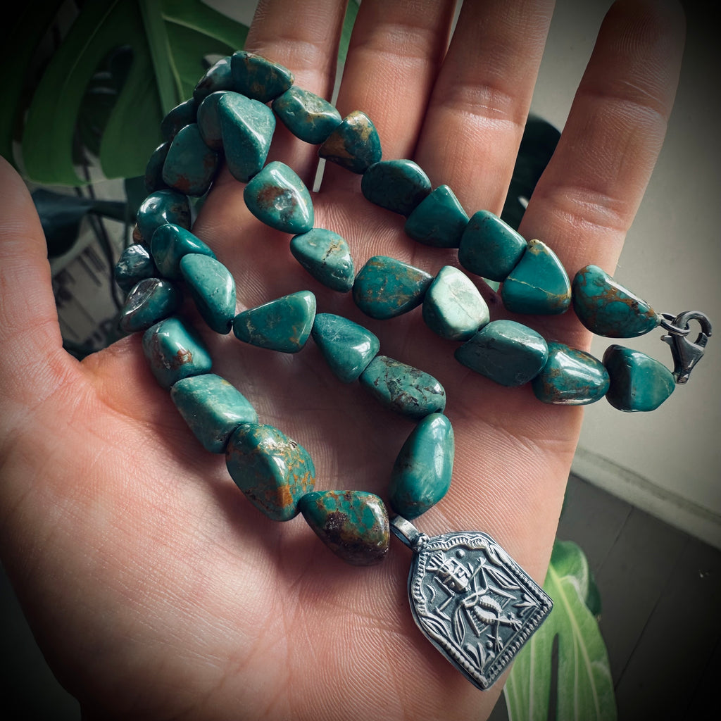 15” reworked chunky turquoise bead necklace with spiritual talisman in sterling silver